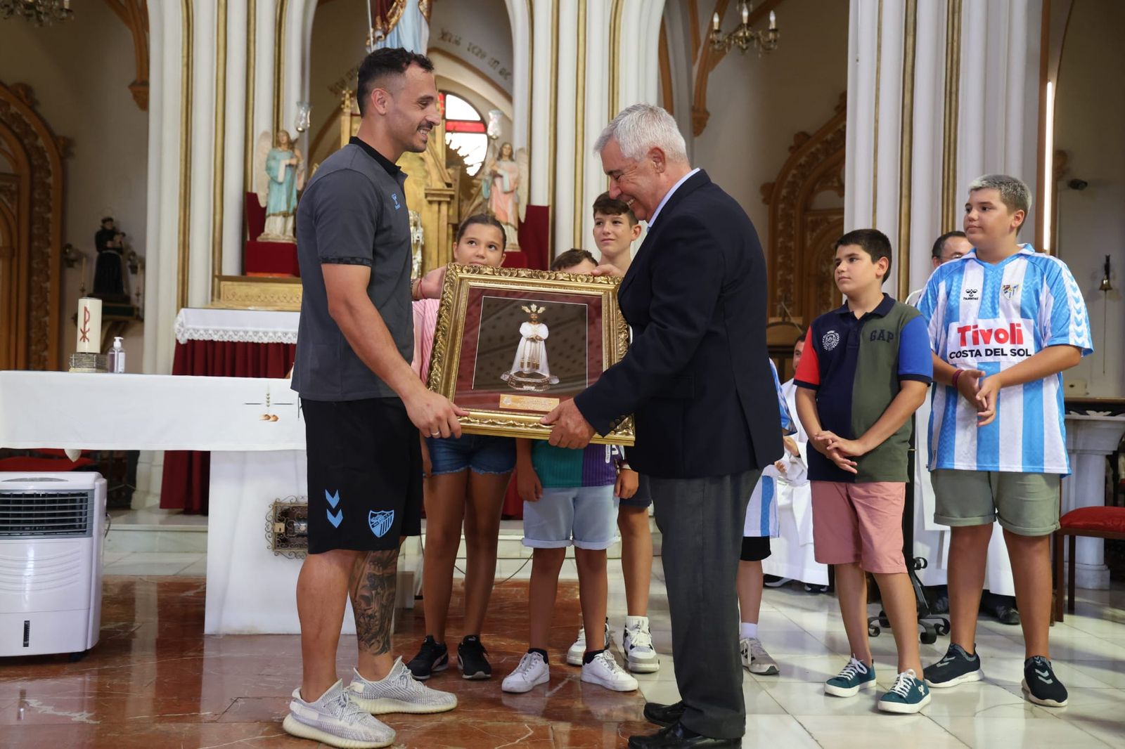 Las fotos del Málaga CF en su visita al Cautivo