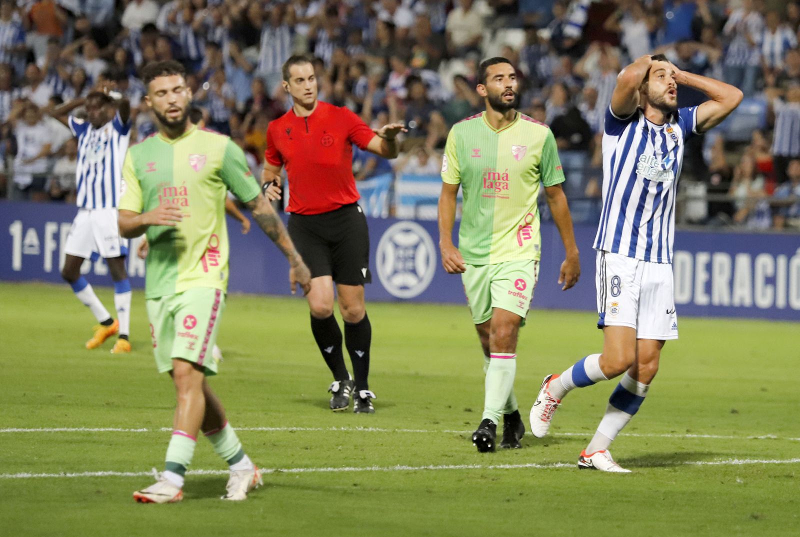 Imágenes del encuentro entre el Recreativo de Huelva y el Málaga