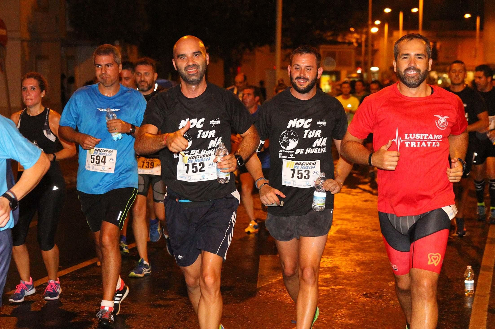 La VII Carrera Nocturna de Huelva en imágenes
