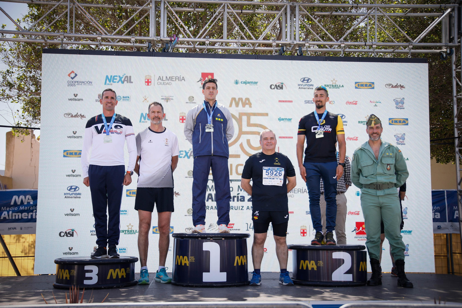 Imágenes de los premiados en la Media maratón de la Cuidad de Almería