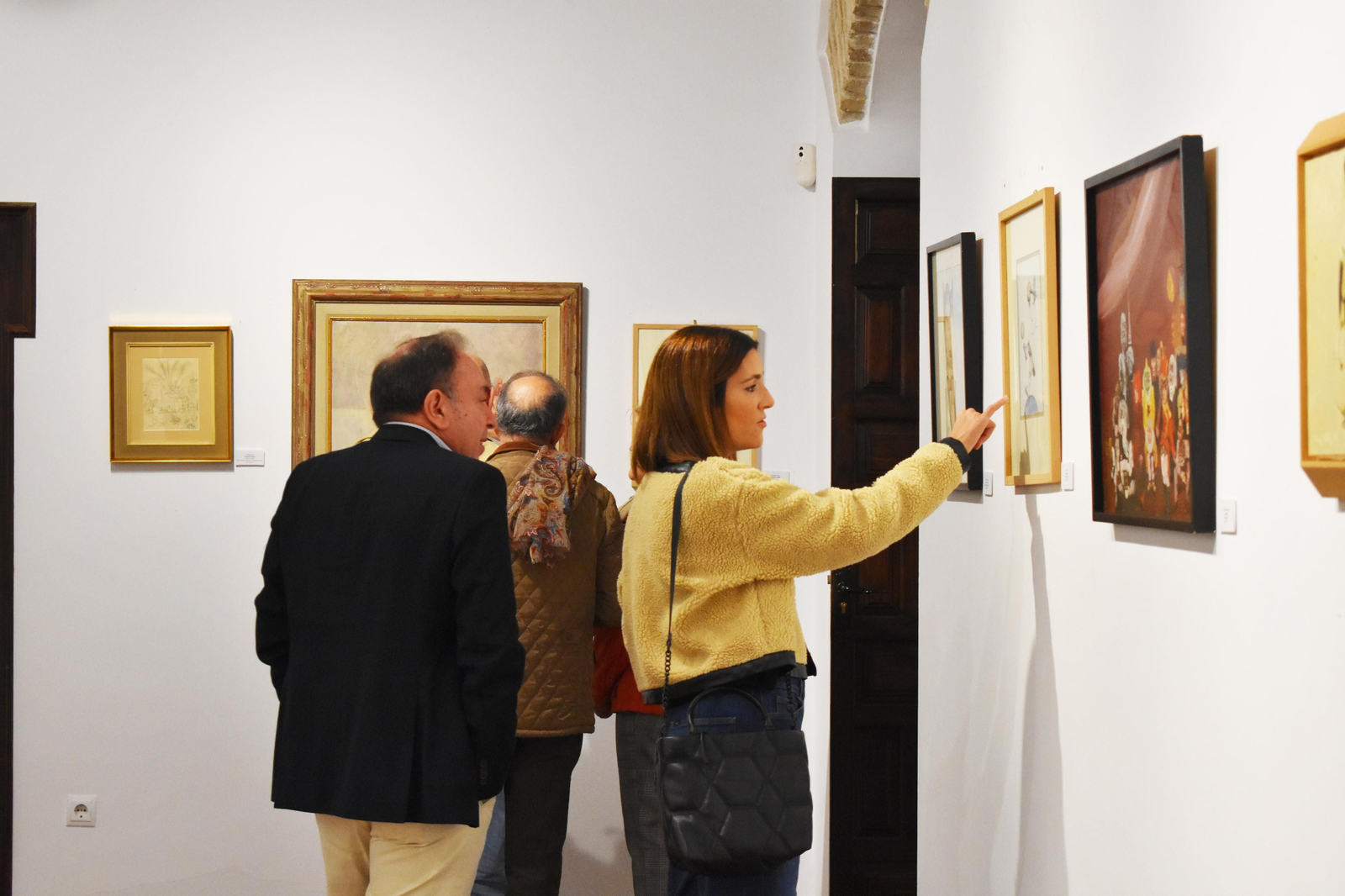Visitantes a la exposición. Visitantes a la exposición.