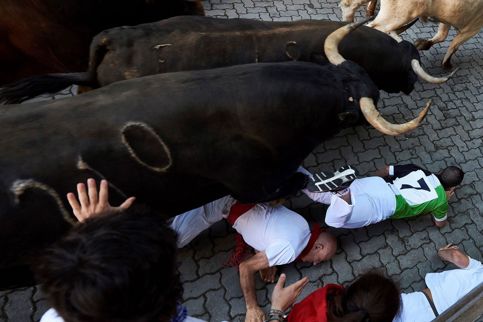 El quinto encierro de los Sanfermines, en imágenes