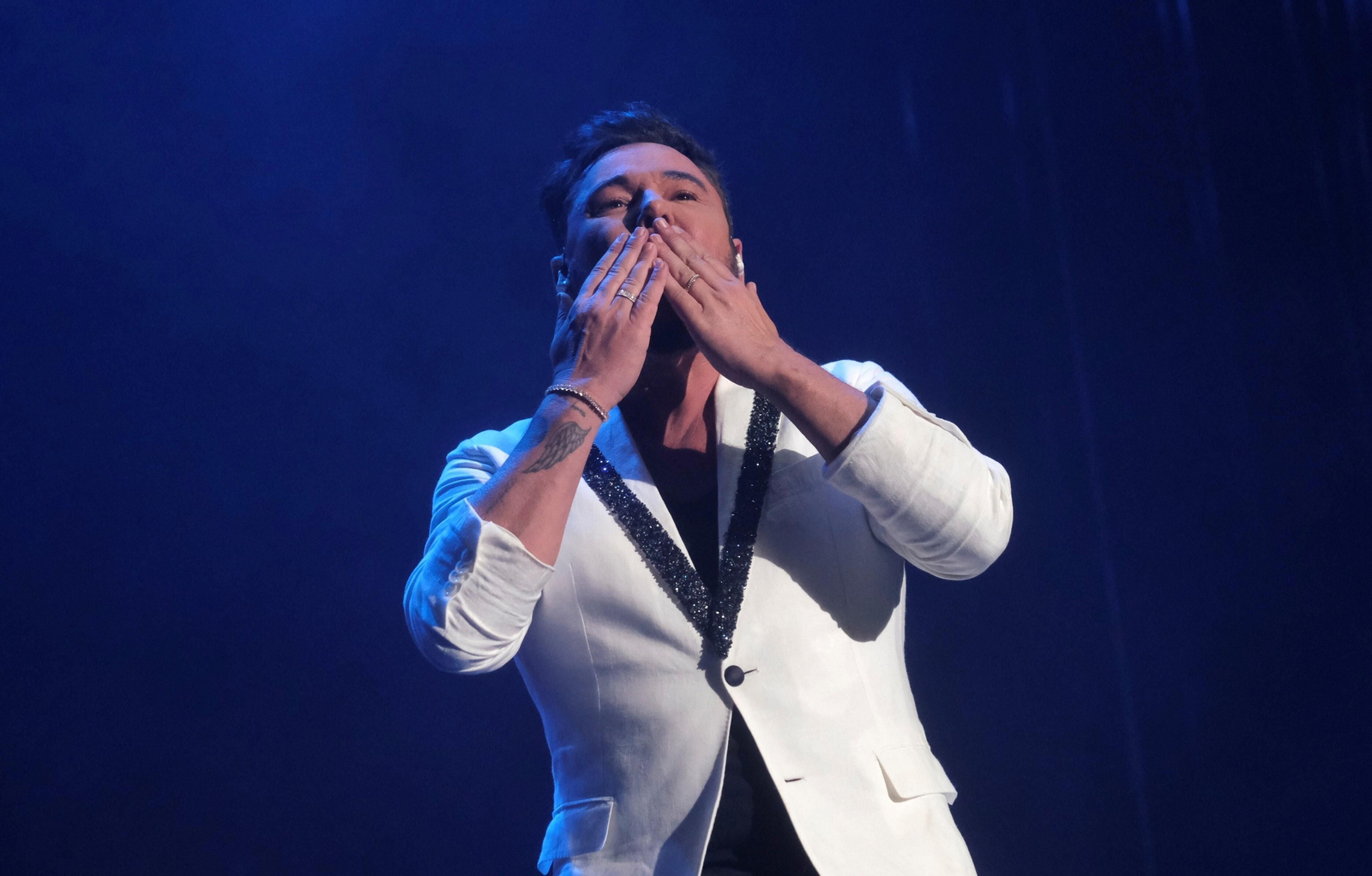 El concierto de Miguel Poveda en la plaza de toros de Córdoba, en fotografías