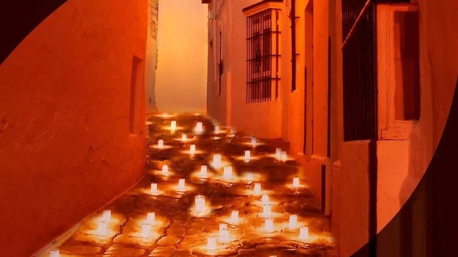 Un rincón del pueblo bañado por la luz de las velas