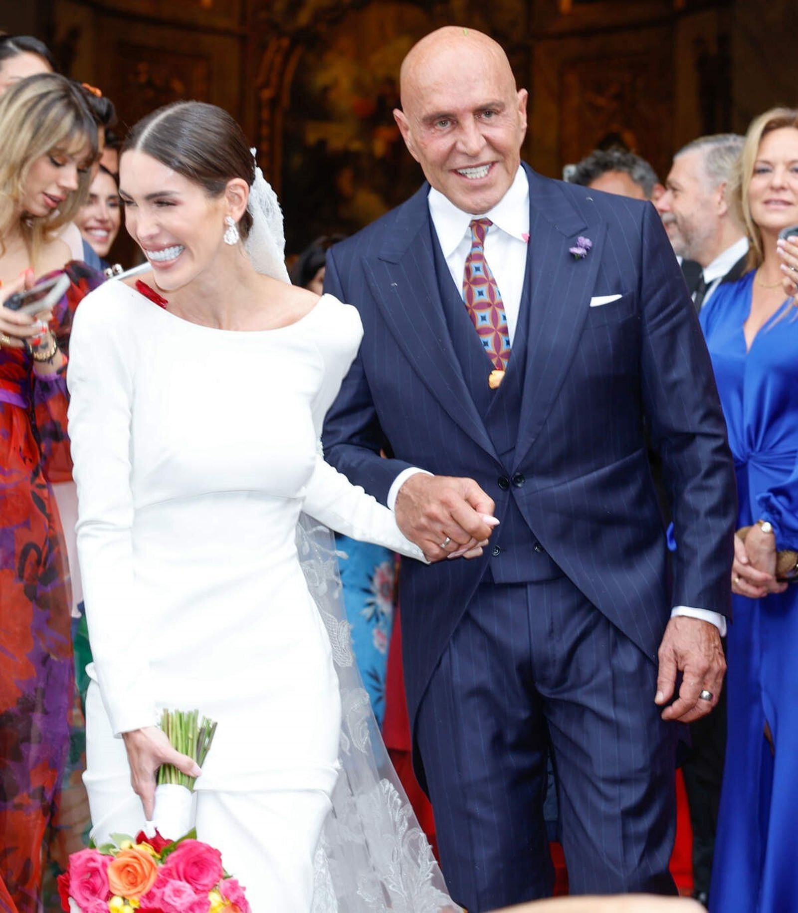 Kiko Matamoros y su mujer al salir de la iglesia