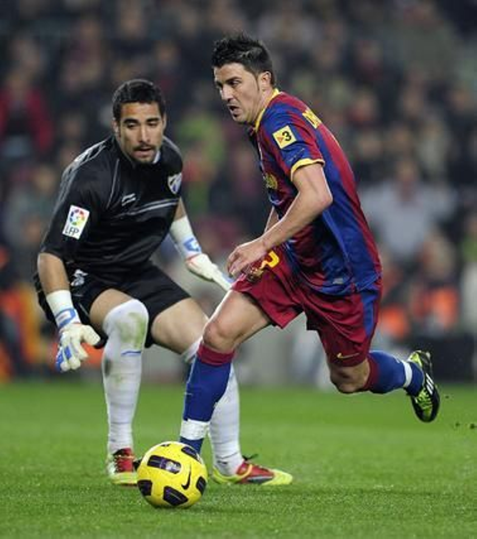 El Málaga se va goleado del Camp Nou ante una nueva exhibición del Barça (4-1). / AFP