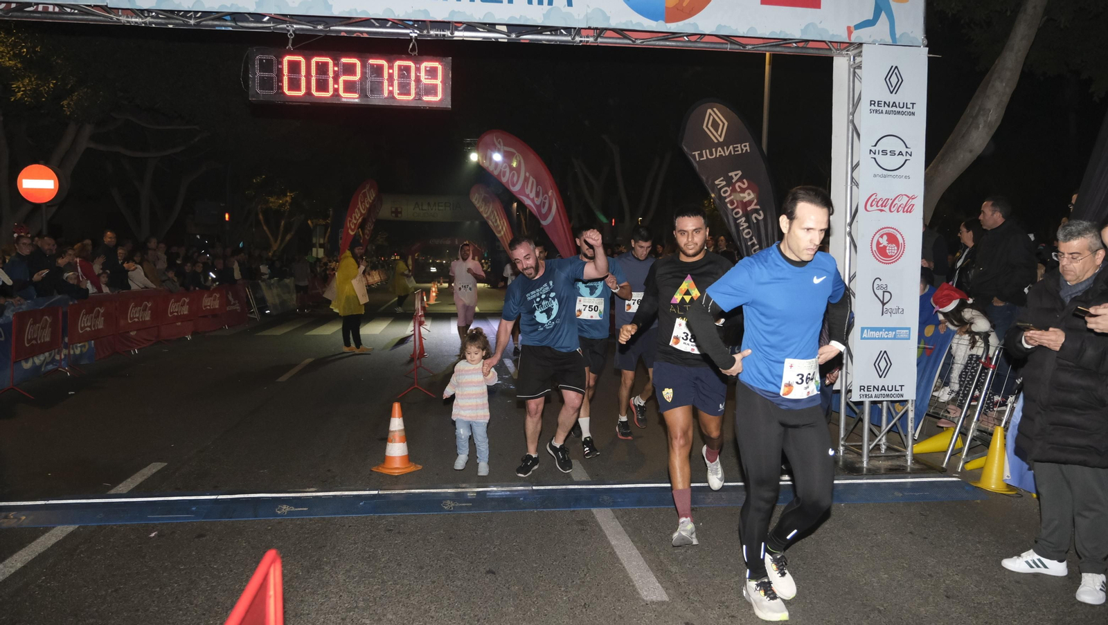 Imágenes de la XIV edición de la San Silvestre de Almería