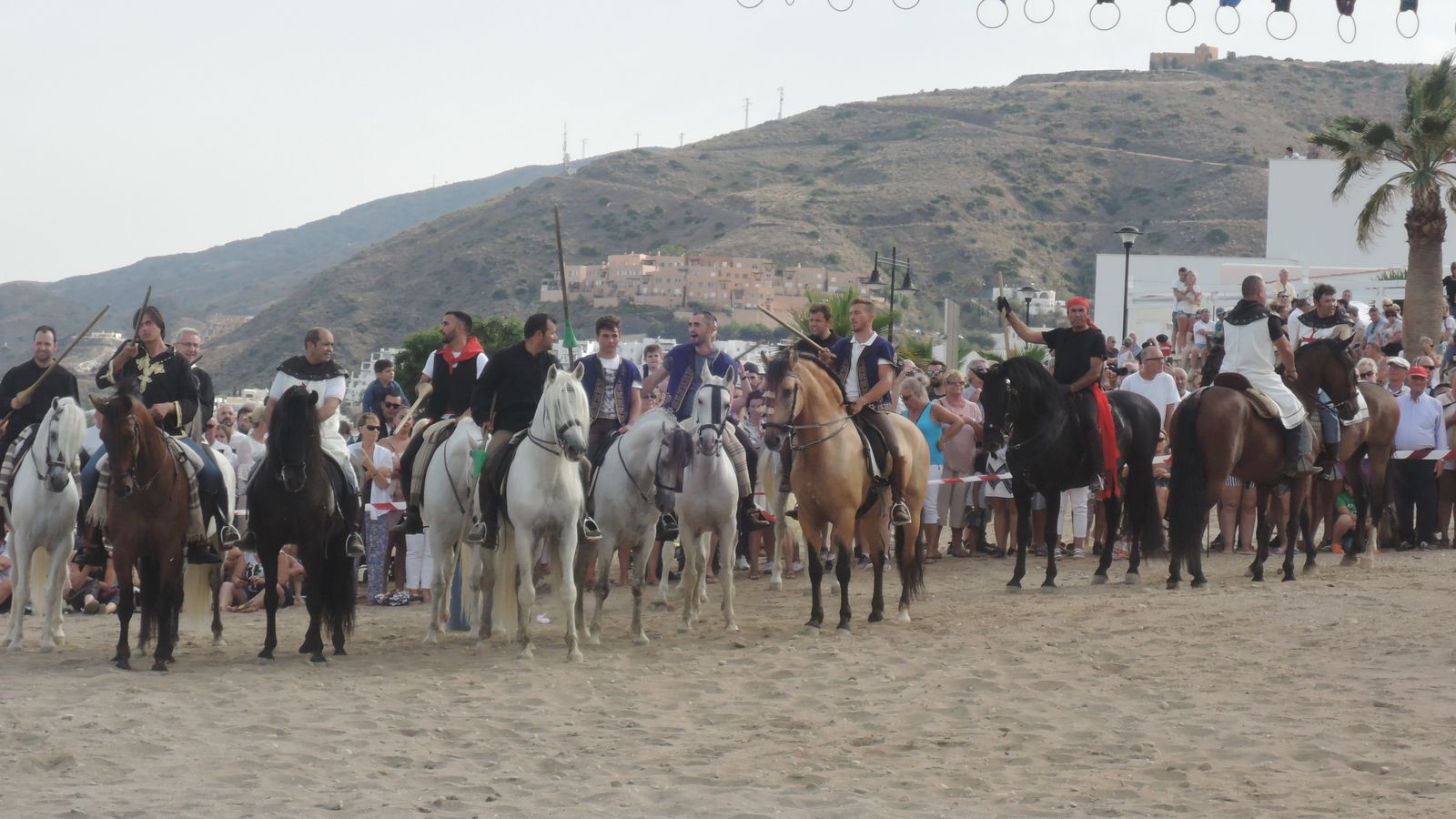 Los caballos en la playa.