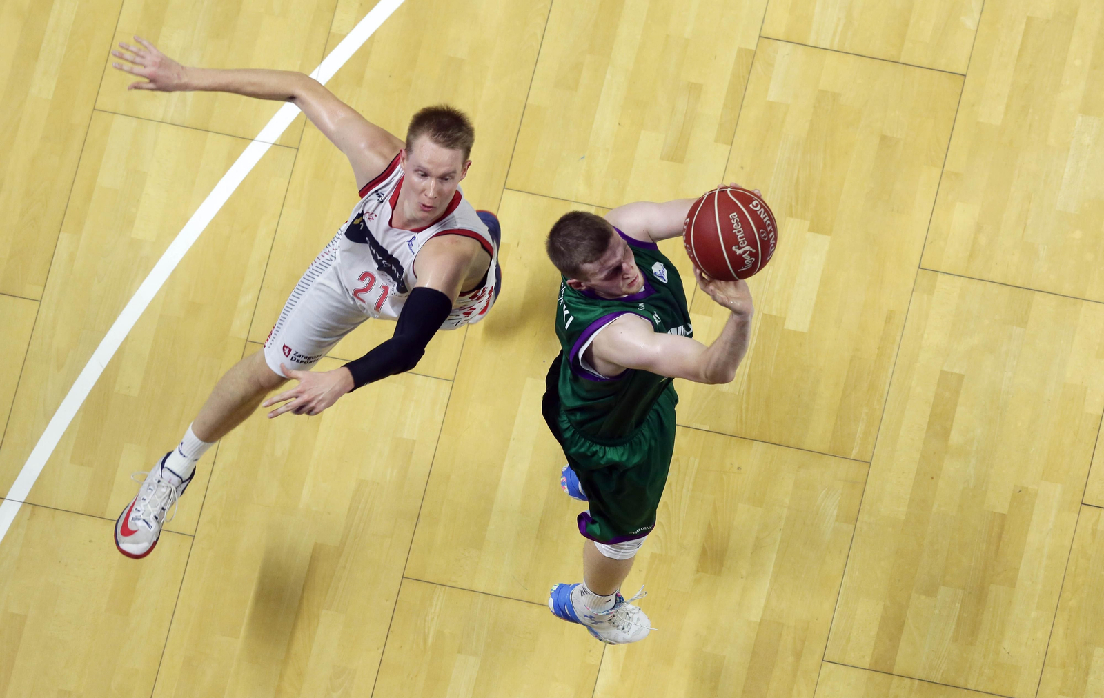 Los cinco años de Adam Waczynski en el Unicaja, en fotos