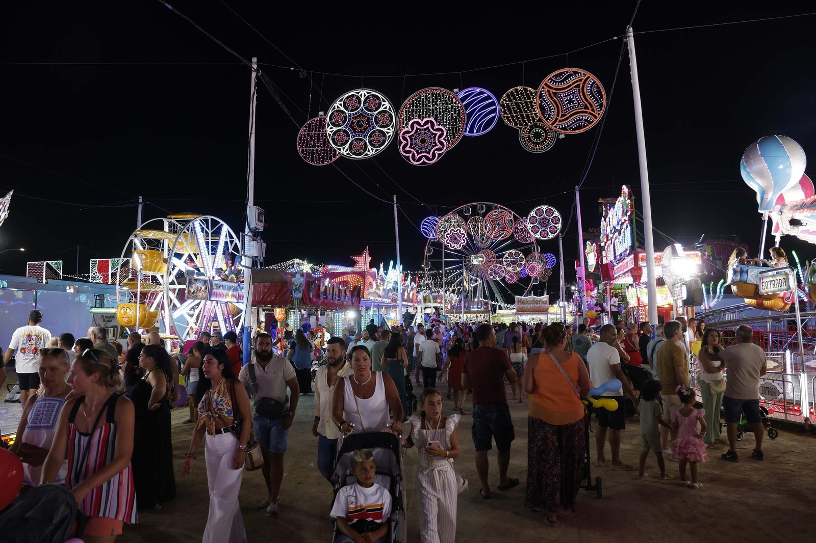 Búscate en las fotos del jueves de la Feria de La Línea
