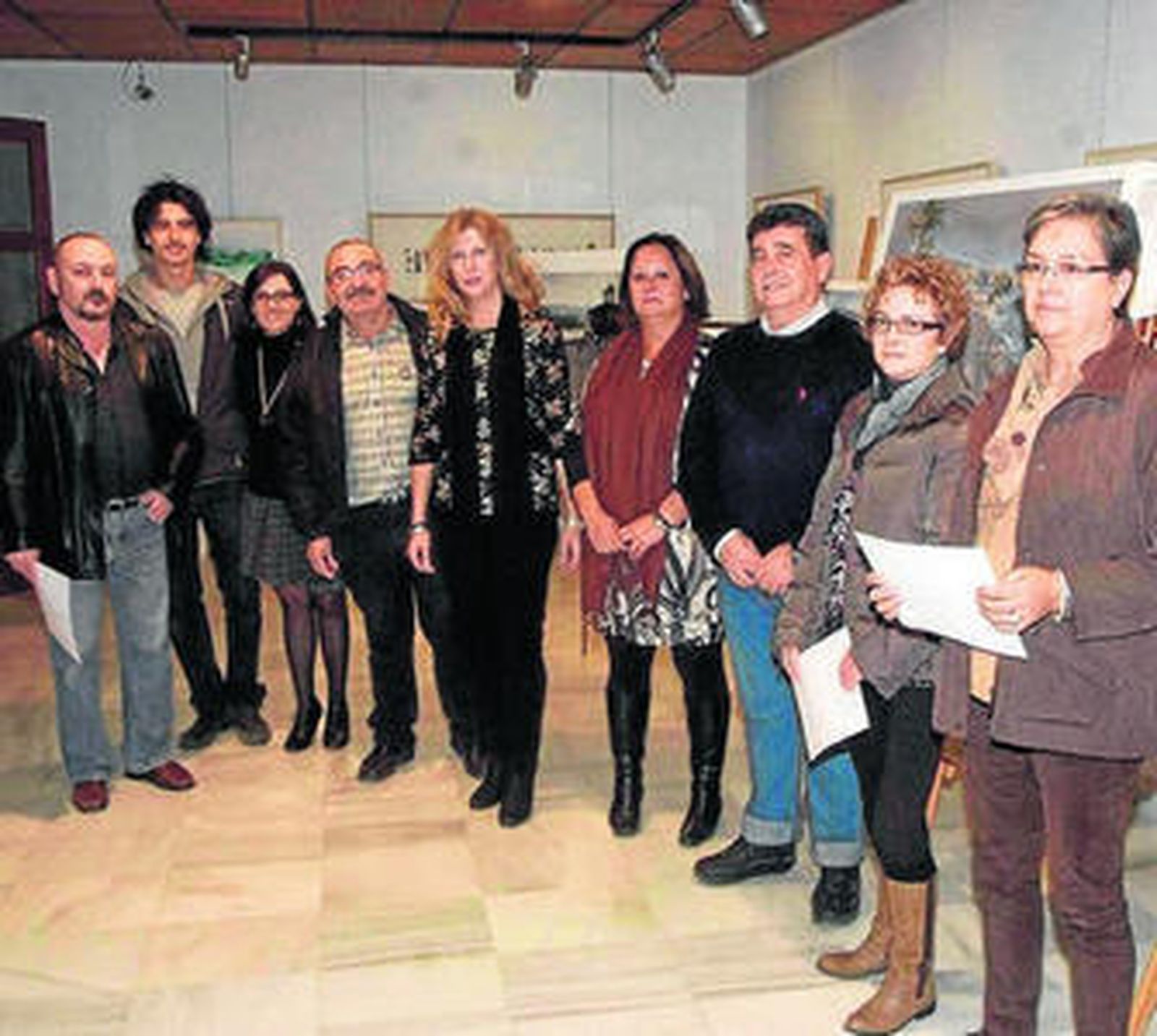 María Dolores Ortega con organizadores y premiados.