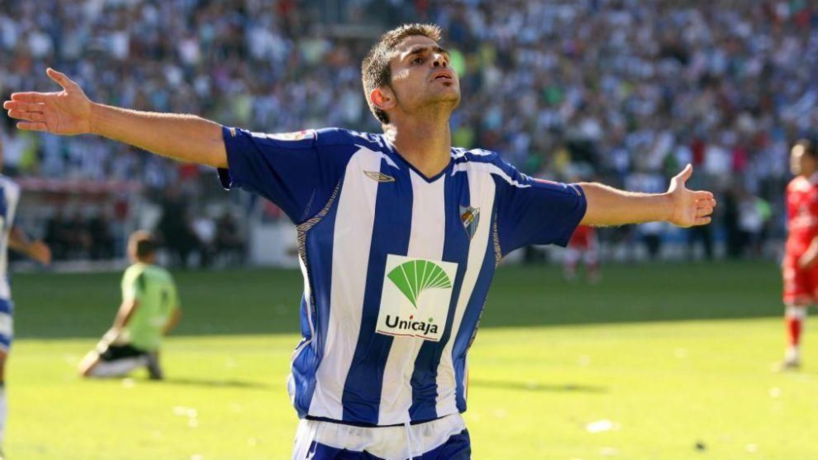 Antonio Hidalgo, con la camiseta del Málaga con Unicaja de patrocinador.