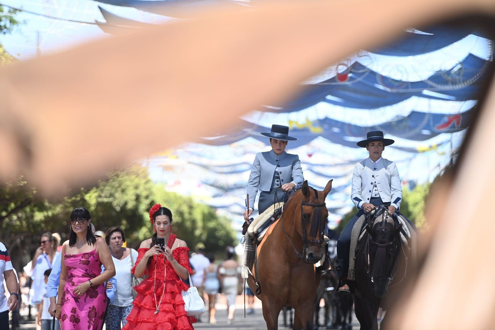 Las fotos del lunes festivo en la Feria en Málaga
