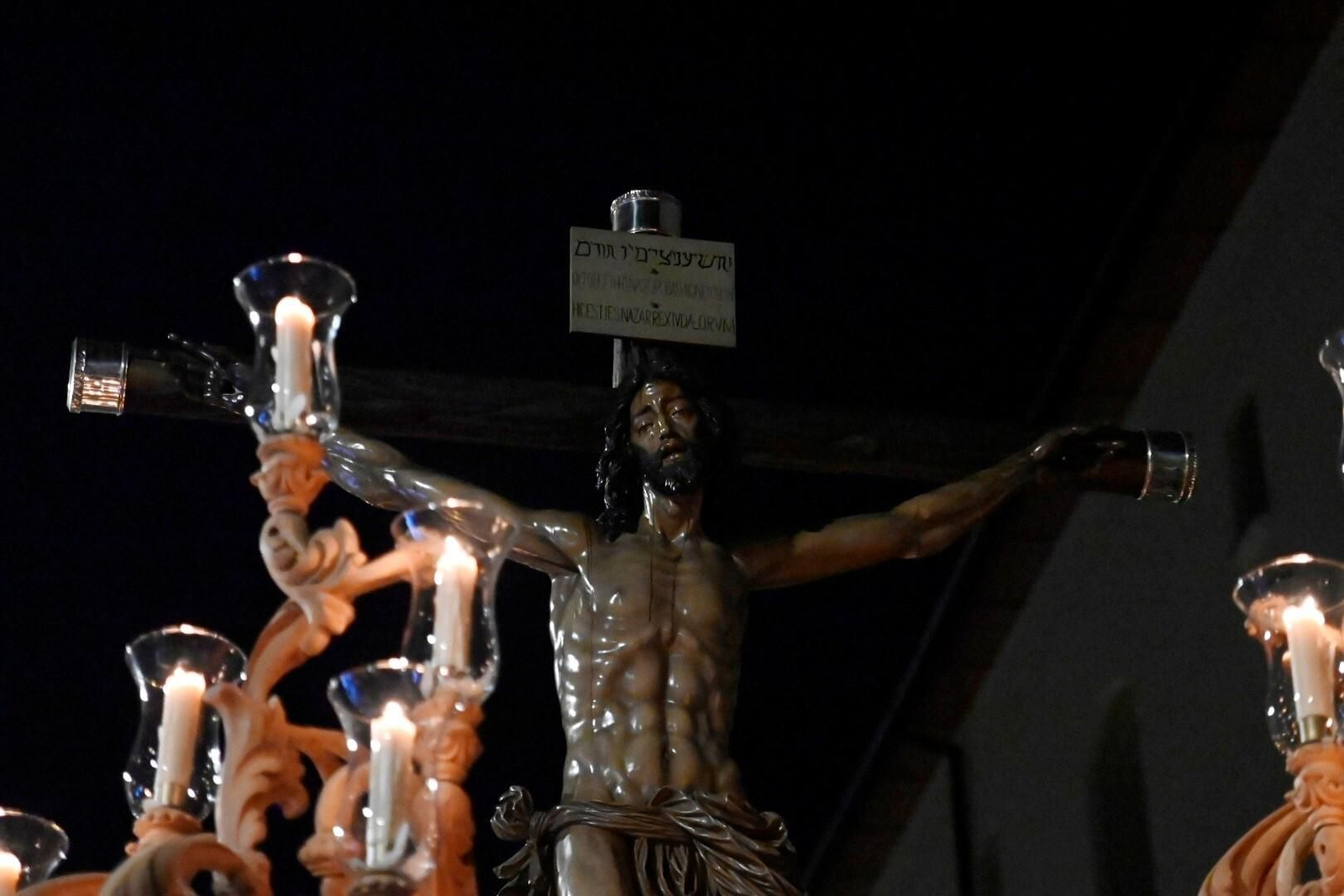 El vía crucis del Cristo de la Providencia, en imágenes