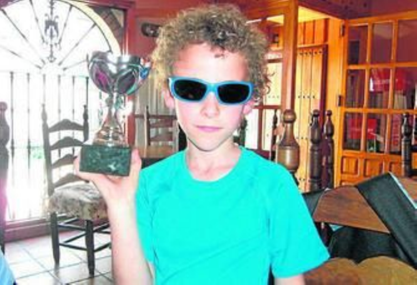 El pequeño Rafa, tras participar en un duatlón en Almonaster en el 2013.