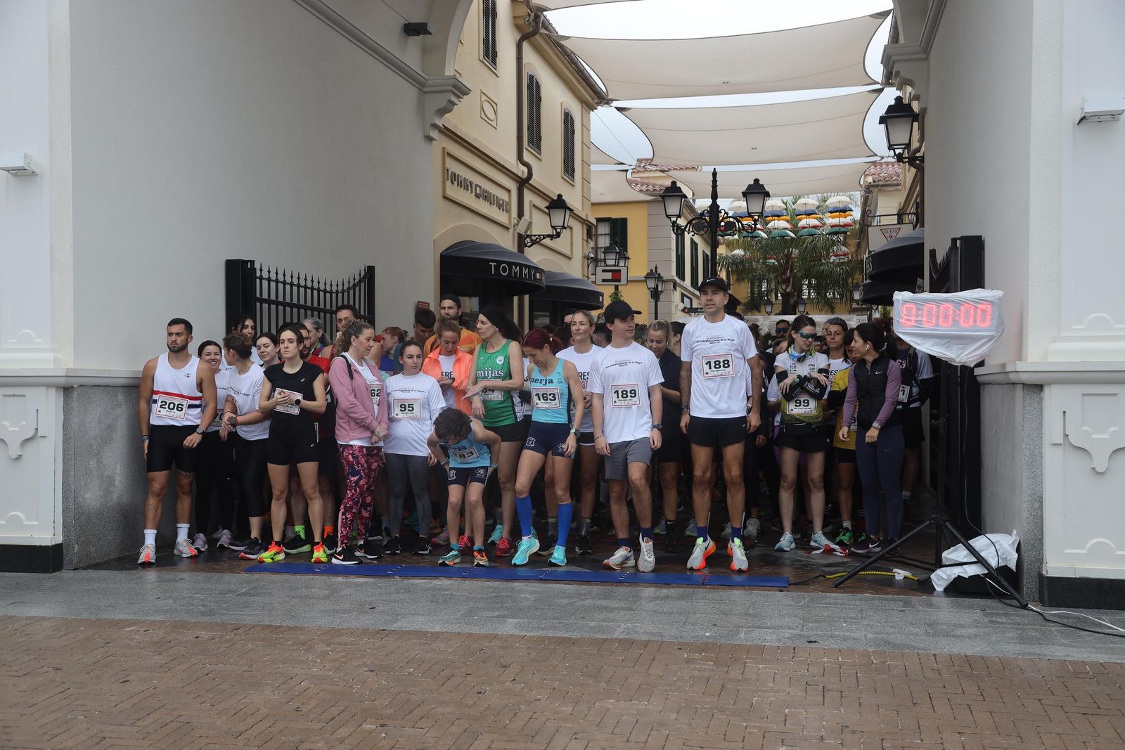 La Carrera por el Día Internacional de la Mujer en Málaga, en fotos