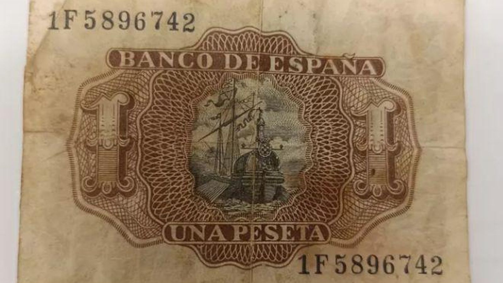 Reverso del billete de una peseta, elaborado en 1953