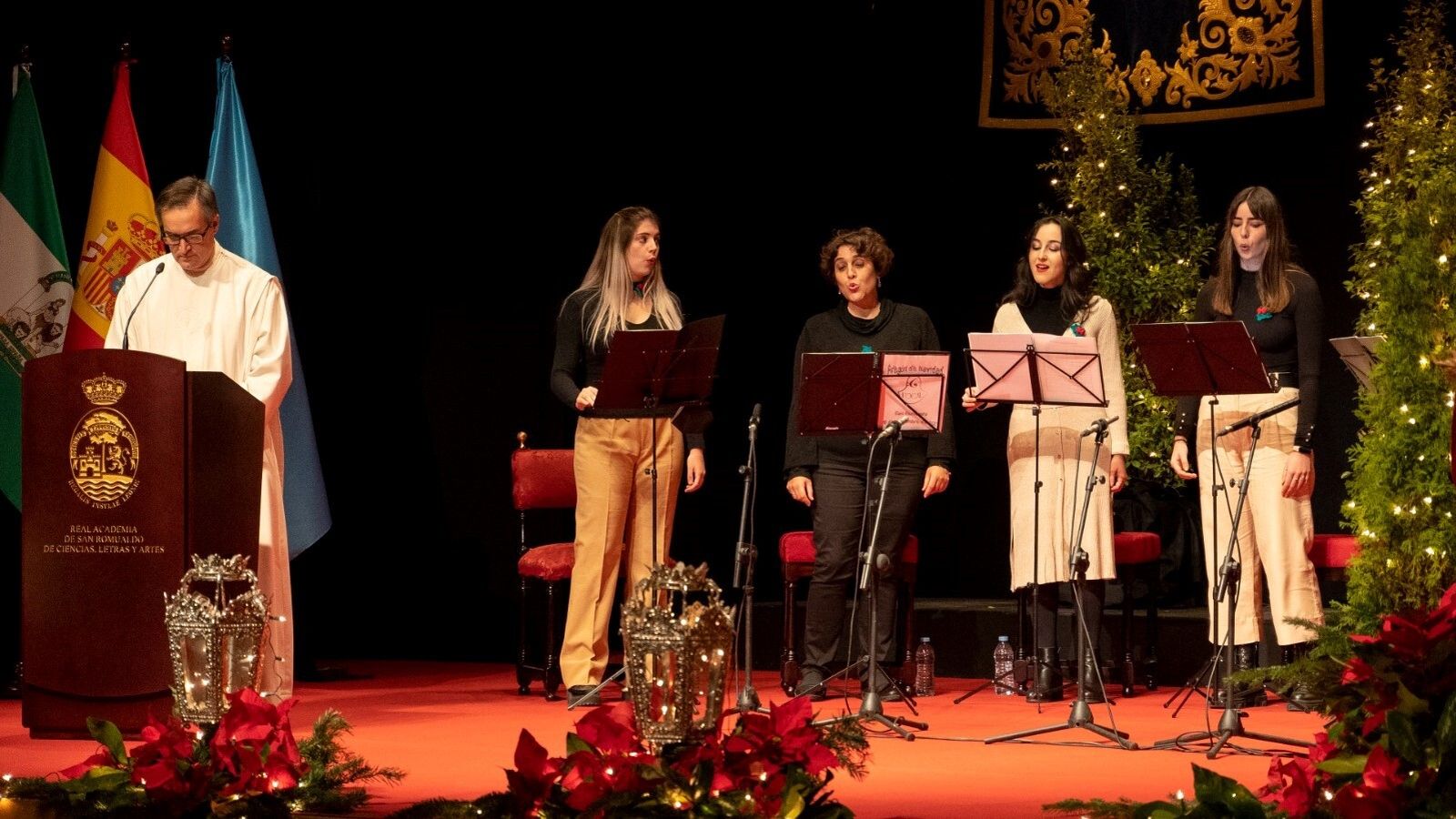Un momento del Pregón de la Navidad que contó también con el acompañamiento del grupo Sexta Vocal.