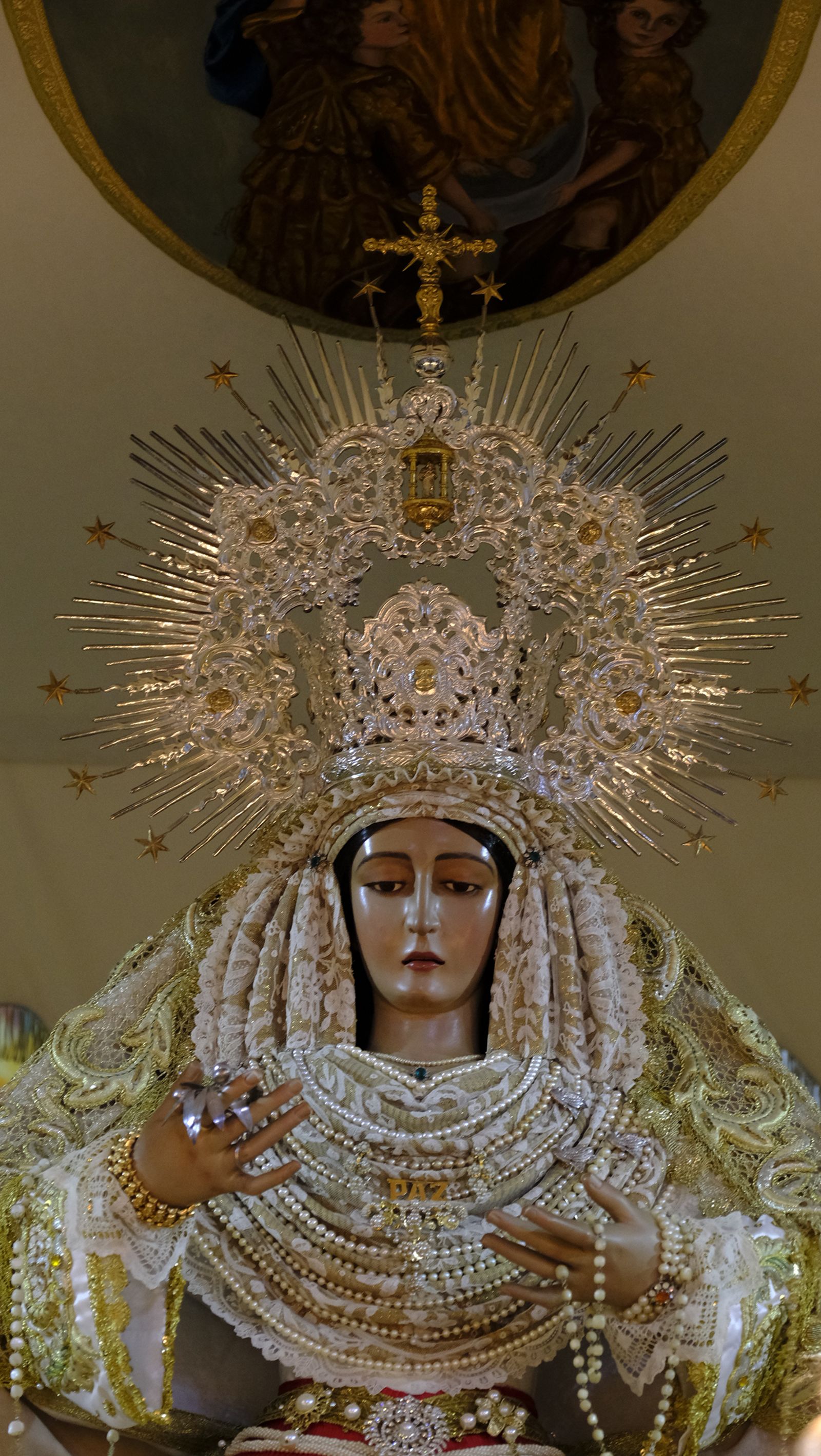 La Borriquita procesiona por las calles de Almería, en imágenes