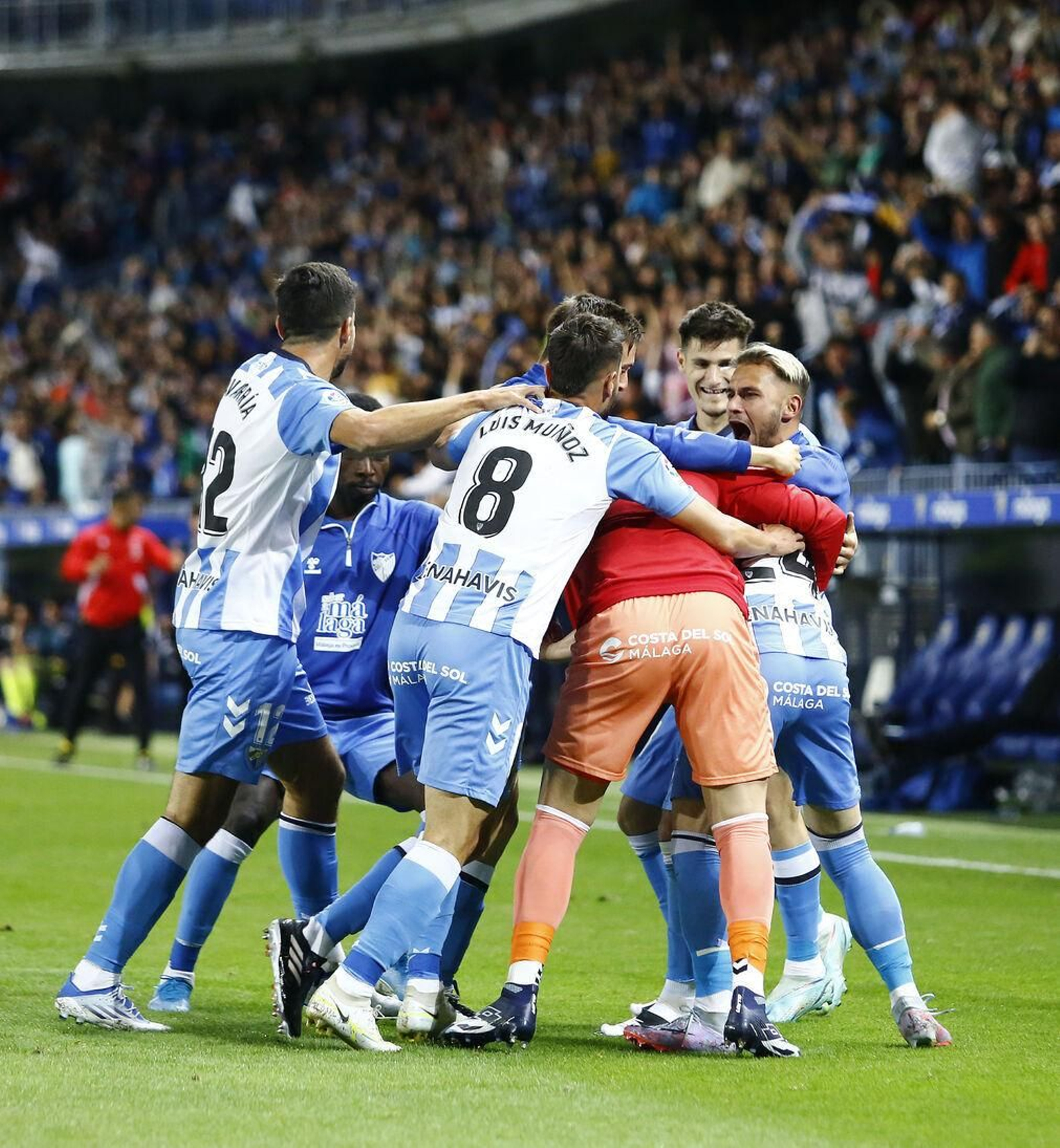 Los jugadores del Málaga celebrando un gol. Los jugadores del Málaga celebrando un gol.