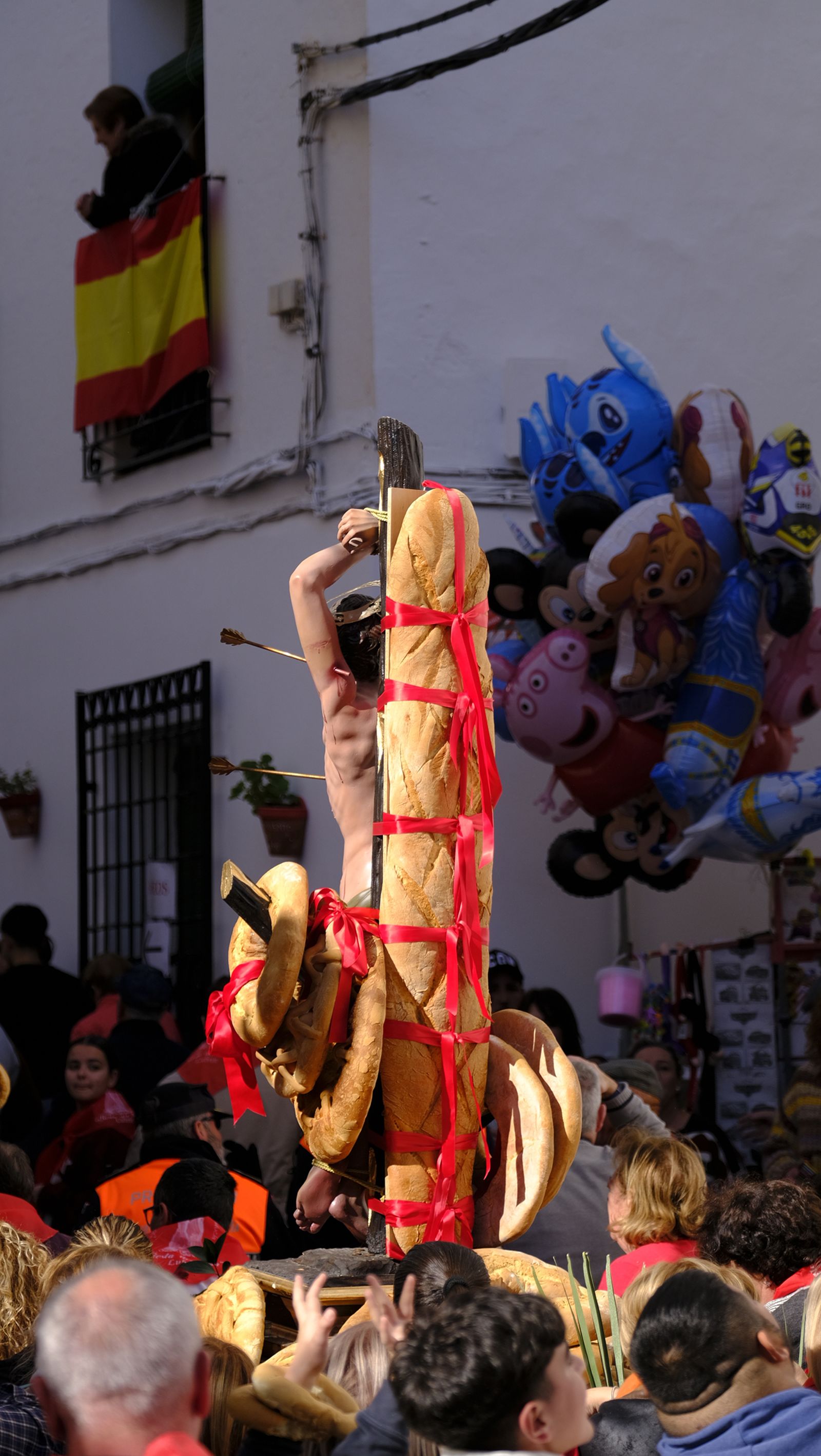 Procesión de San Sebastián y tirada de roscos en Lubrín, en imágenes
