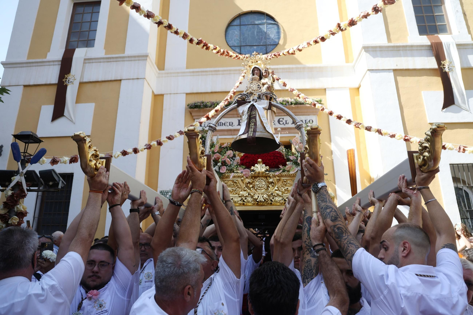 La procesión de la Virgen del Carmen en El Palo, en Málaga, en imágenes