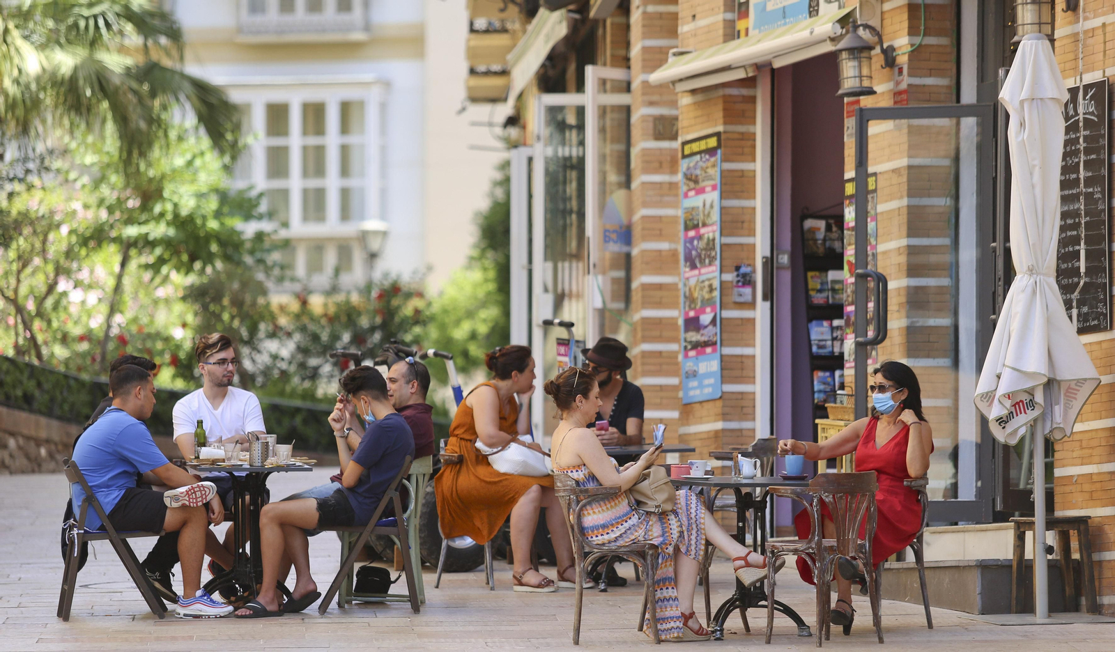Fotos del primer día de mascarillas obligatorias en las playas y el Centro de Málaga