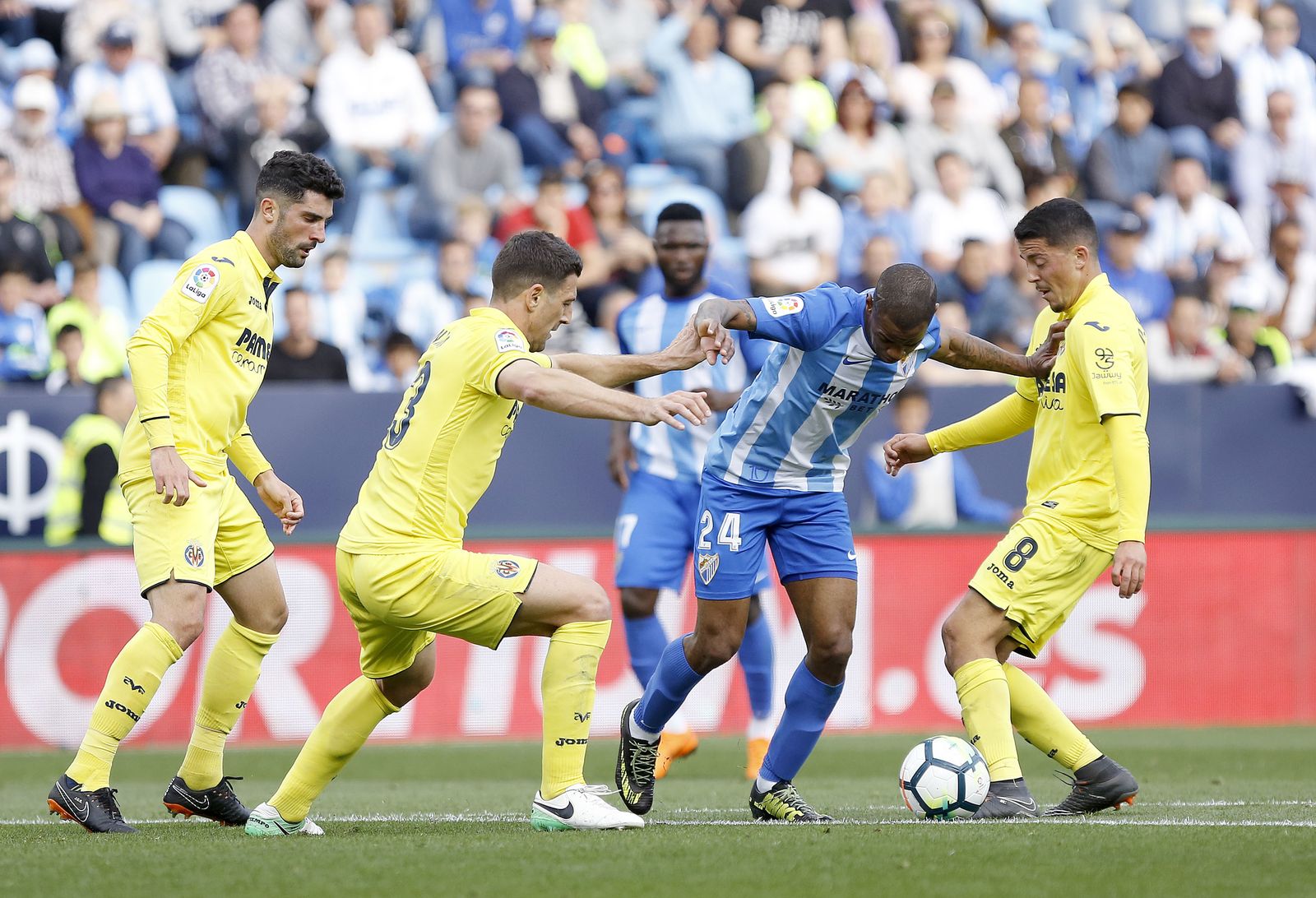 Fornals, en una acción ante Rolan del pasado Málaga-Villarreal.