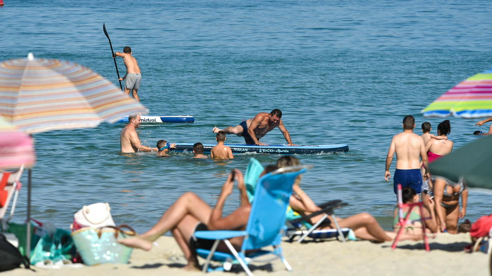 Fotos de la tarde en la playa del El Rinconcillo en plena ola de calor