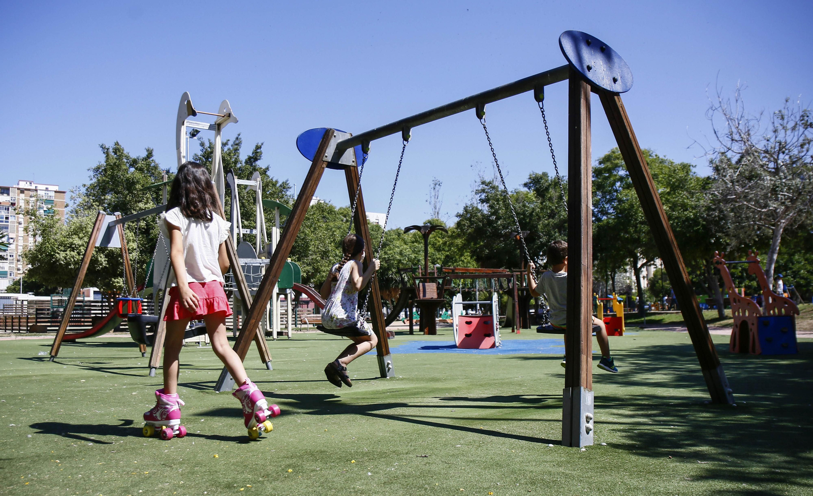 Fotos de la reapertura de los parques infantiles en Málaga.