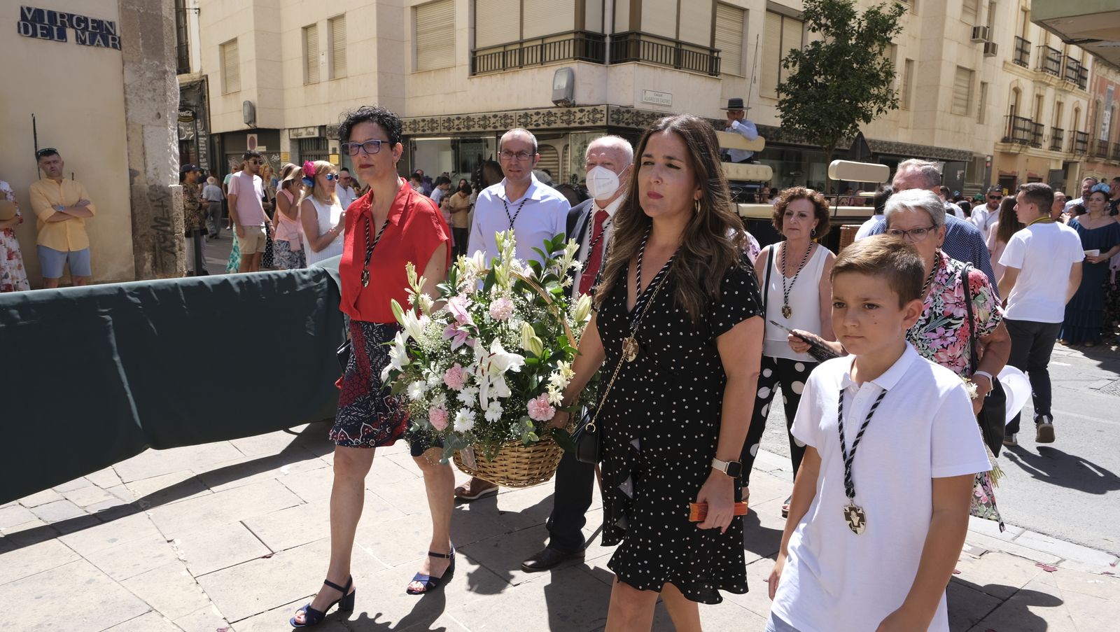 Imágenes de la ofrenda floral a la Virgen del Mar. Feria de Almería 2022