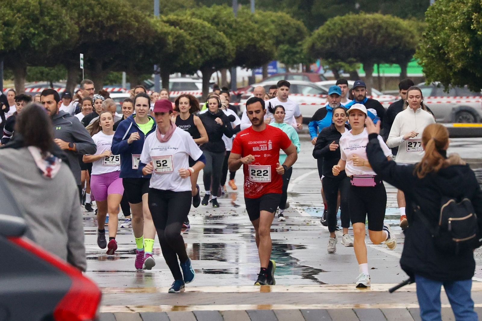 La Carrera por el Día Internacional de la Mujer en Málaga, en fotos
