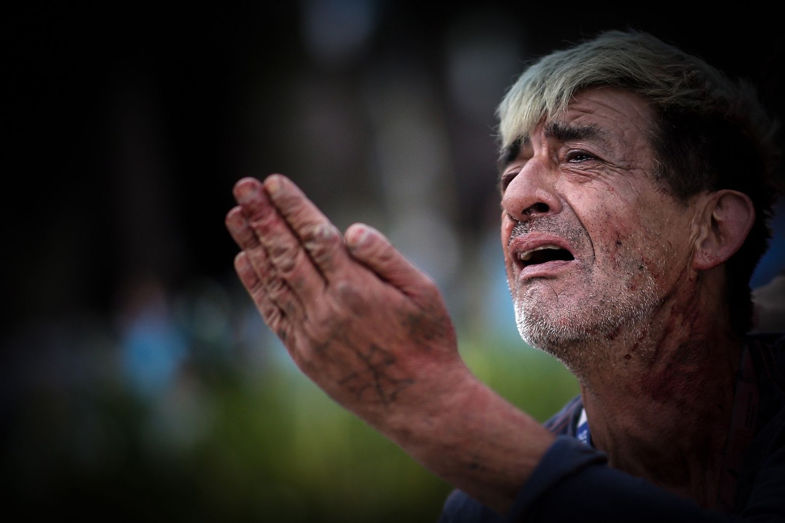 Fotos de los incidentes ante la capilla ardiente de Maradona