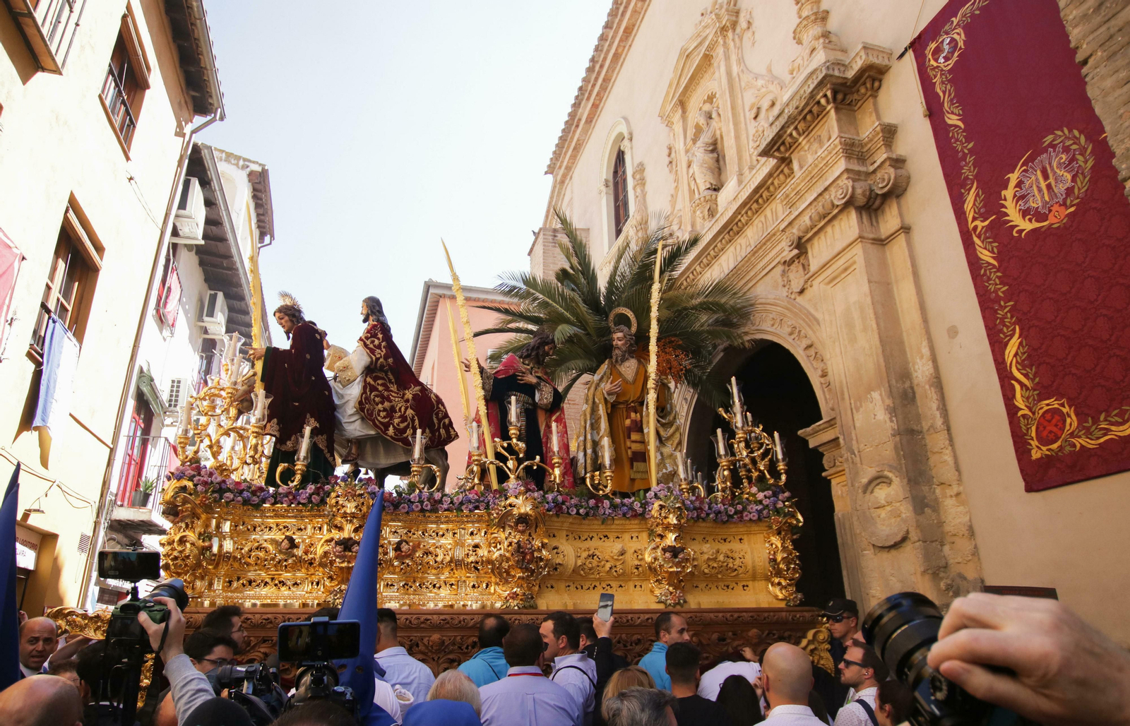 Galería de fotos de La Borriquilla en un soleado Domingo de Ramos