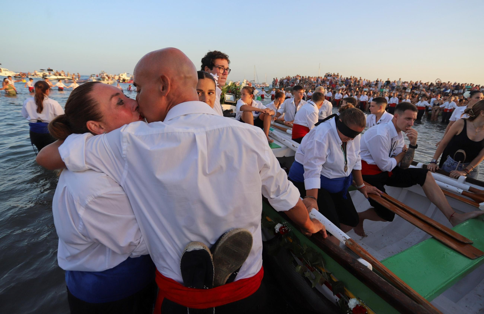La procesión de la Virgen del Carmen en la playa del Palo, en Málaga, en fotos