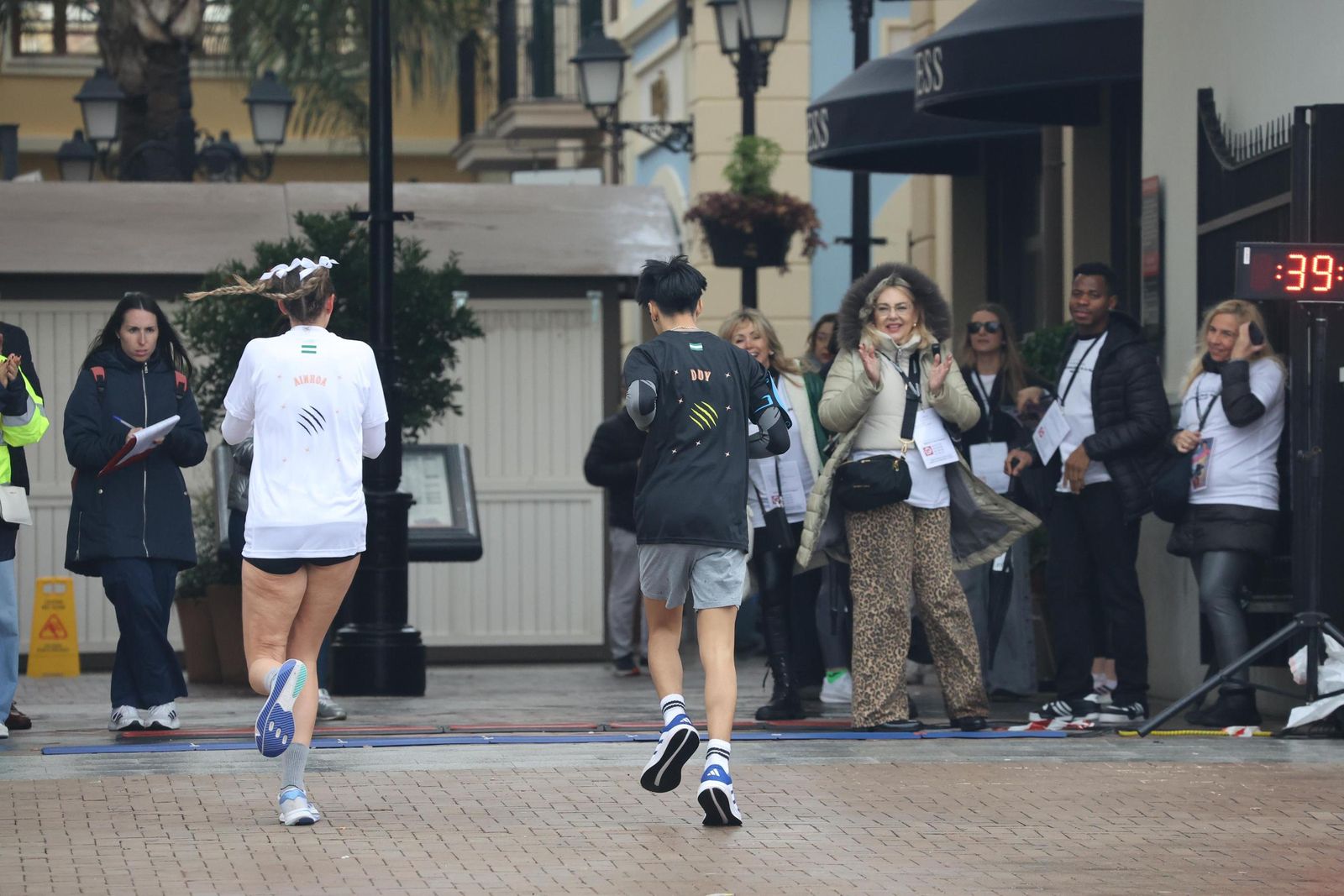 La Carrera por el Día Internacional de la Mujer en Málaga, en fotos