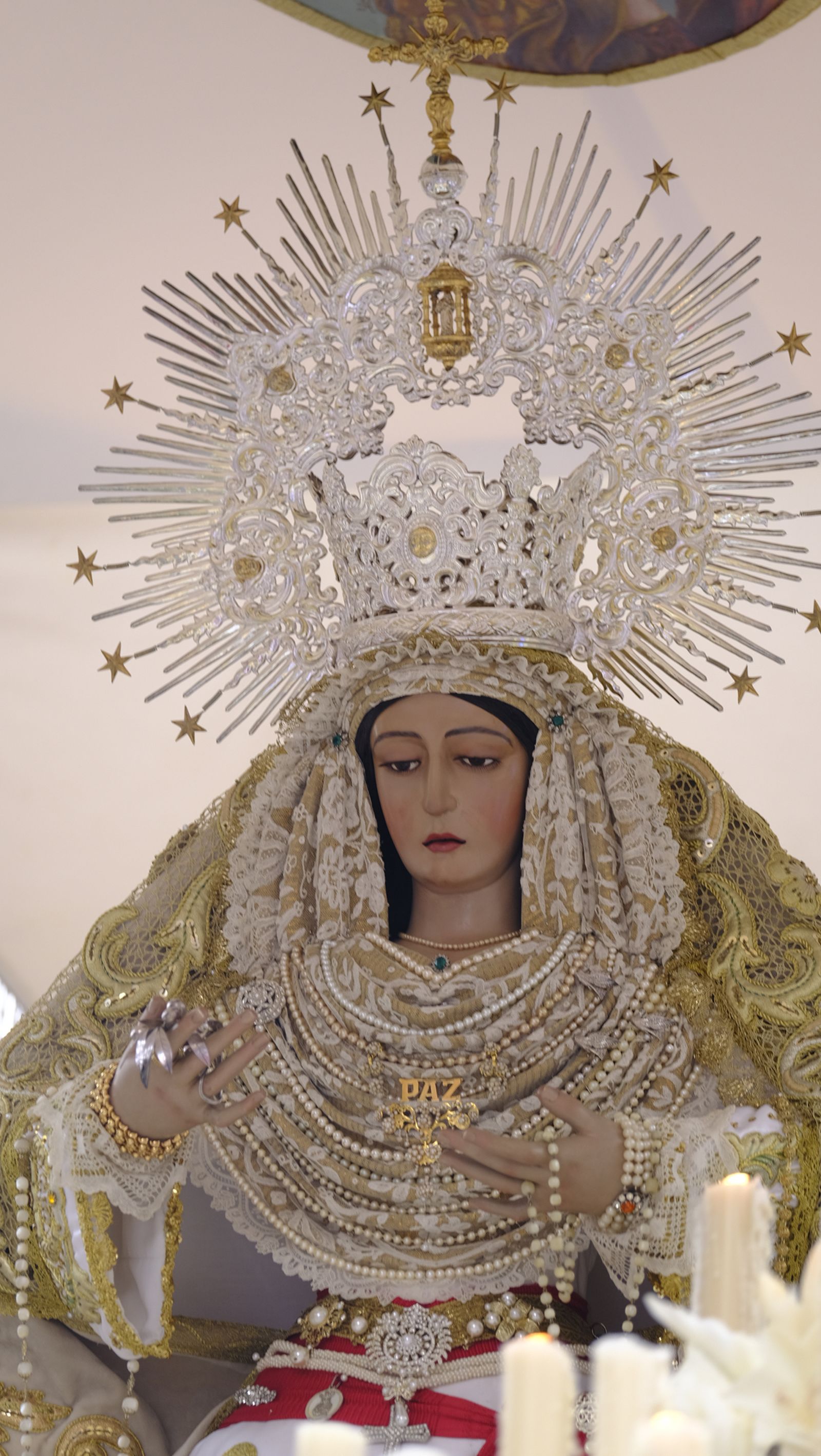 La Borriquita procesiona por las calles de Almería, en imágenes