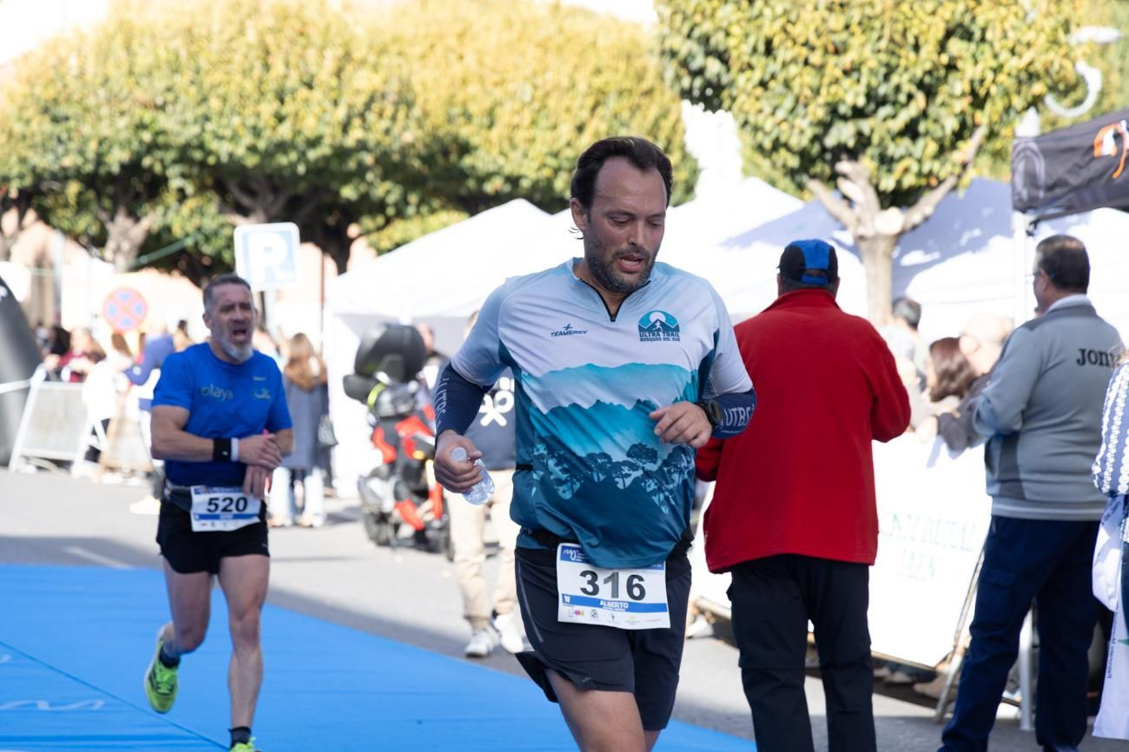 En imágenes: multitudinaria e histórica XXIX Media Maratón 'Ciudad de Jaén' y 10k en memoria de Paco Manzaneda