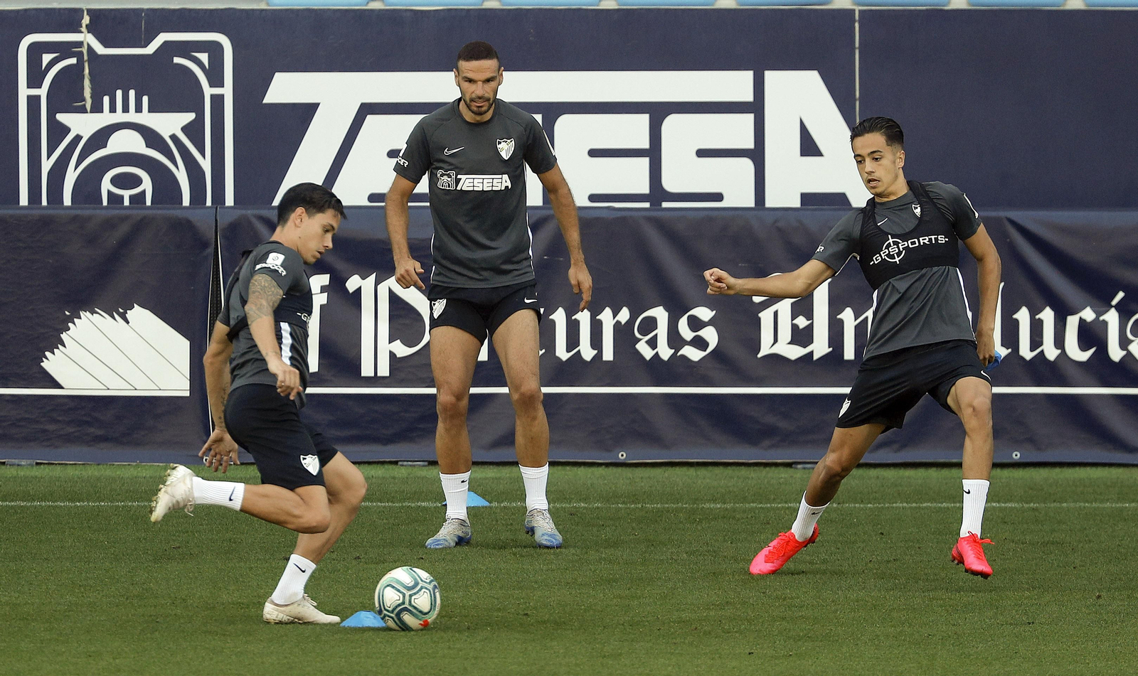 Renato, Lombán e Iván Jaime, en La Rosaleda. Renato, Lombán e Iván Jaime, en La Rosaleda.