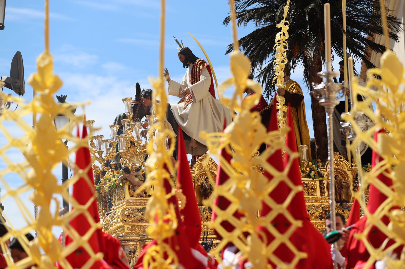 Las mejores imágenes de la hermandad de la Borriquita  de Huelva en el domingo de ramos 2019