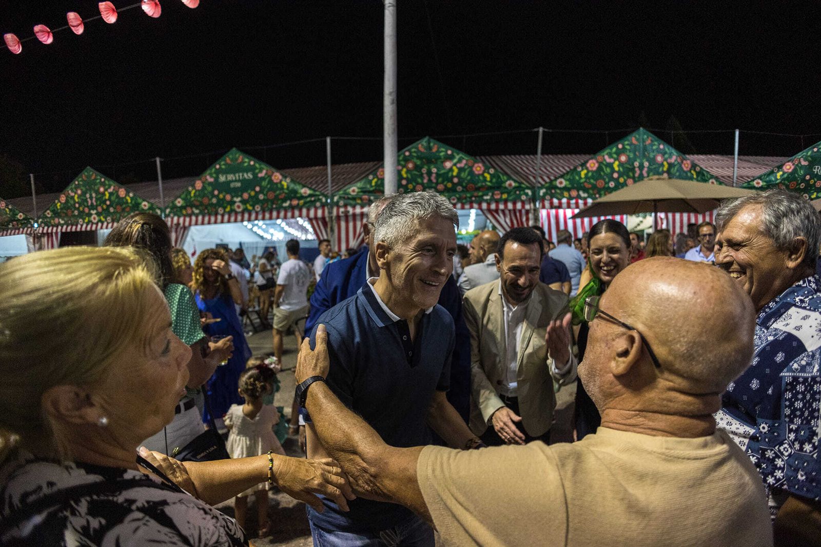 Grande-Marlaska, cabeza de lista para el Congreso del PSOE en la provincia, en la Feria de San Fernando.