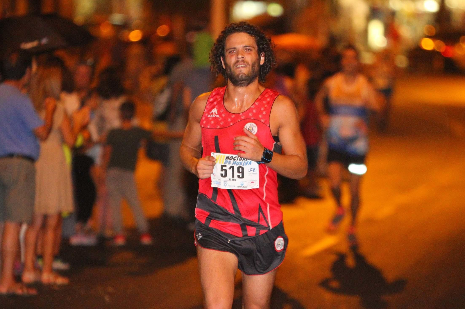 La VII Carrera Nocturna de Huelva en imágenes