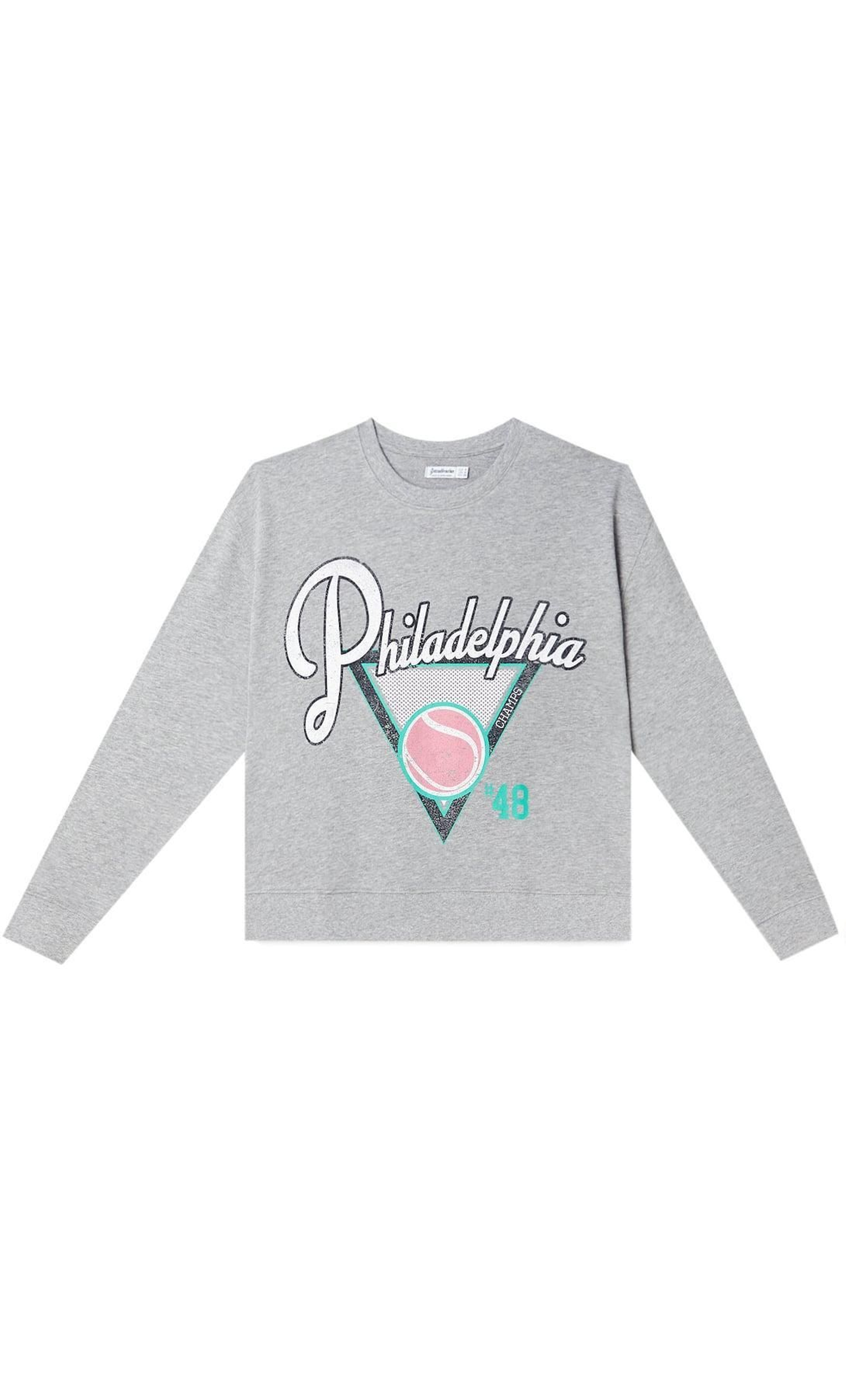 Sudadera gris de Stradivarius. Sudadera gris de Stradivarius.