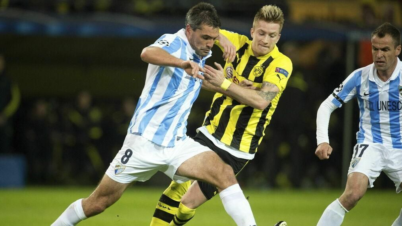 Las imágenes del Borussia Dortmund-Málaga, que cumple siete años.