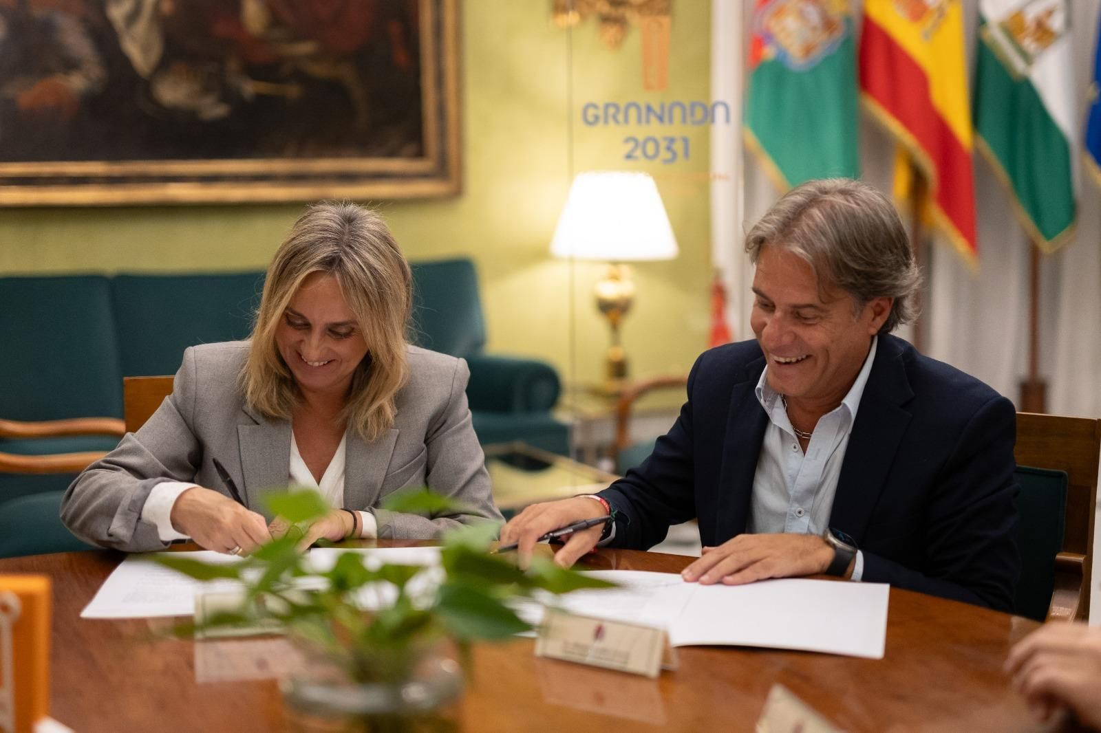 Momento de la firma de la adhesión
