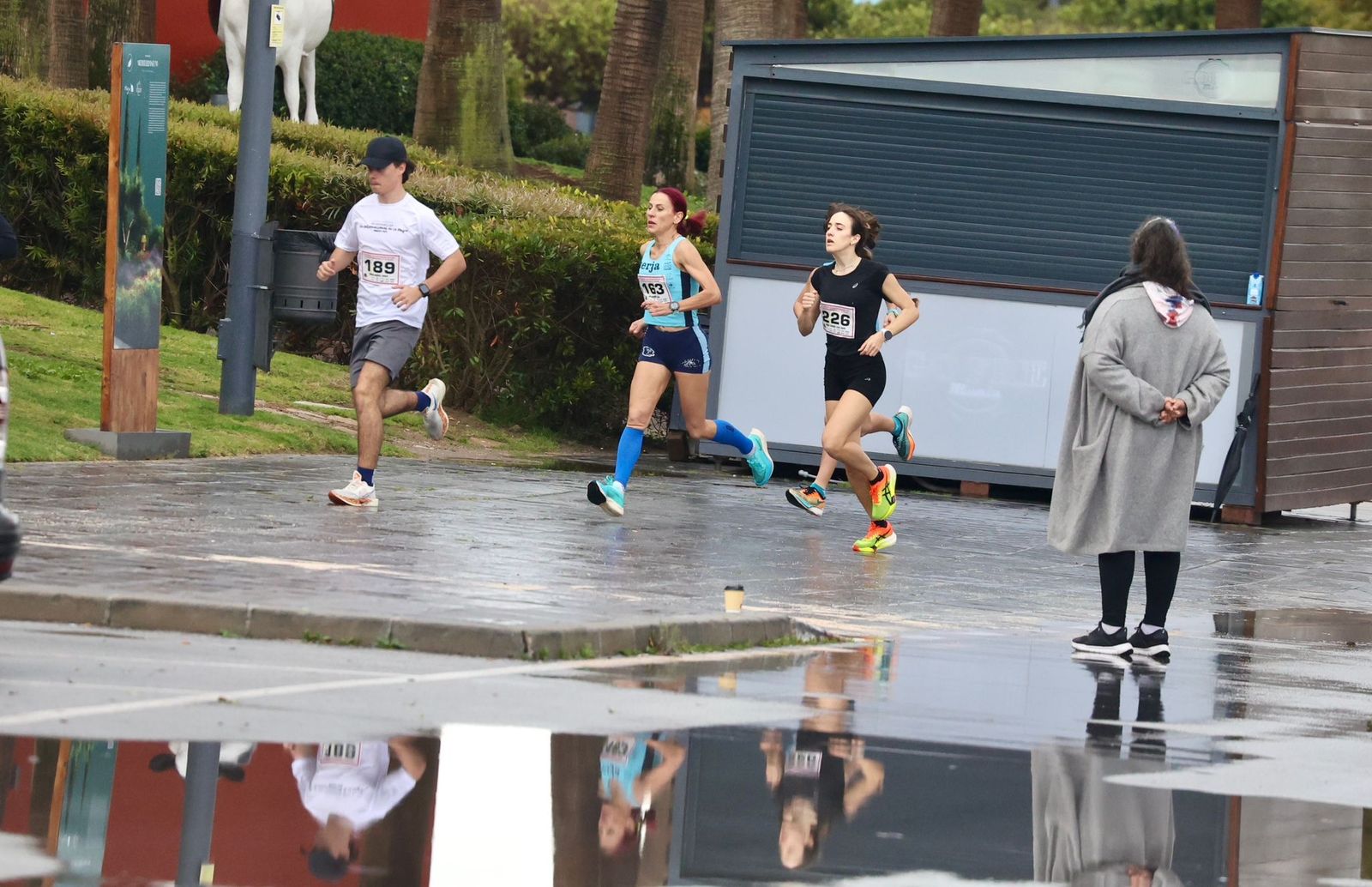 La Carrera por el Día Internacional de la Mujer en Málaga, en fotos
