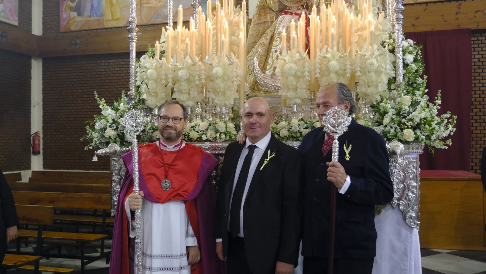 La Borriquita procesiona por las calles de Almería, en imágenes
