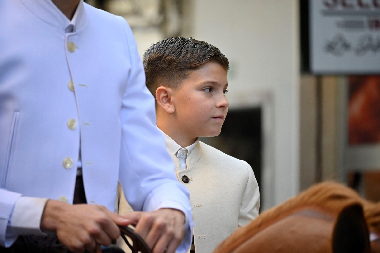 Imágenes de los peregrinos de la Hermandad de Emigrantes en su salida por las calles de Huelva