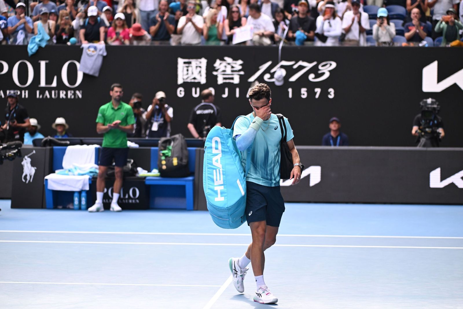 Las fotos de la retirada de Musetti ante Djokovic y del resto de cuartos de final