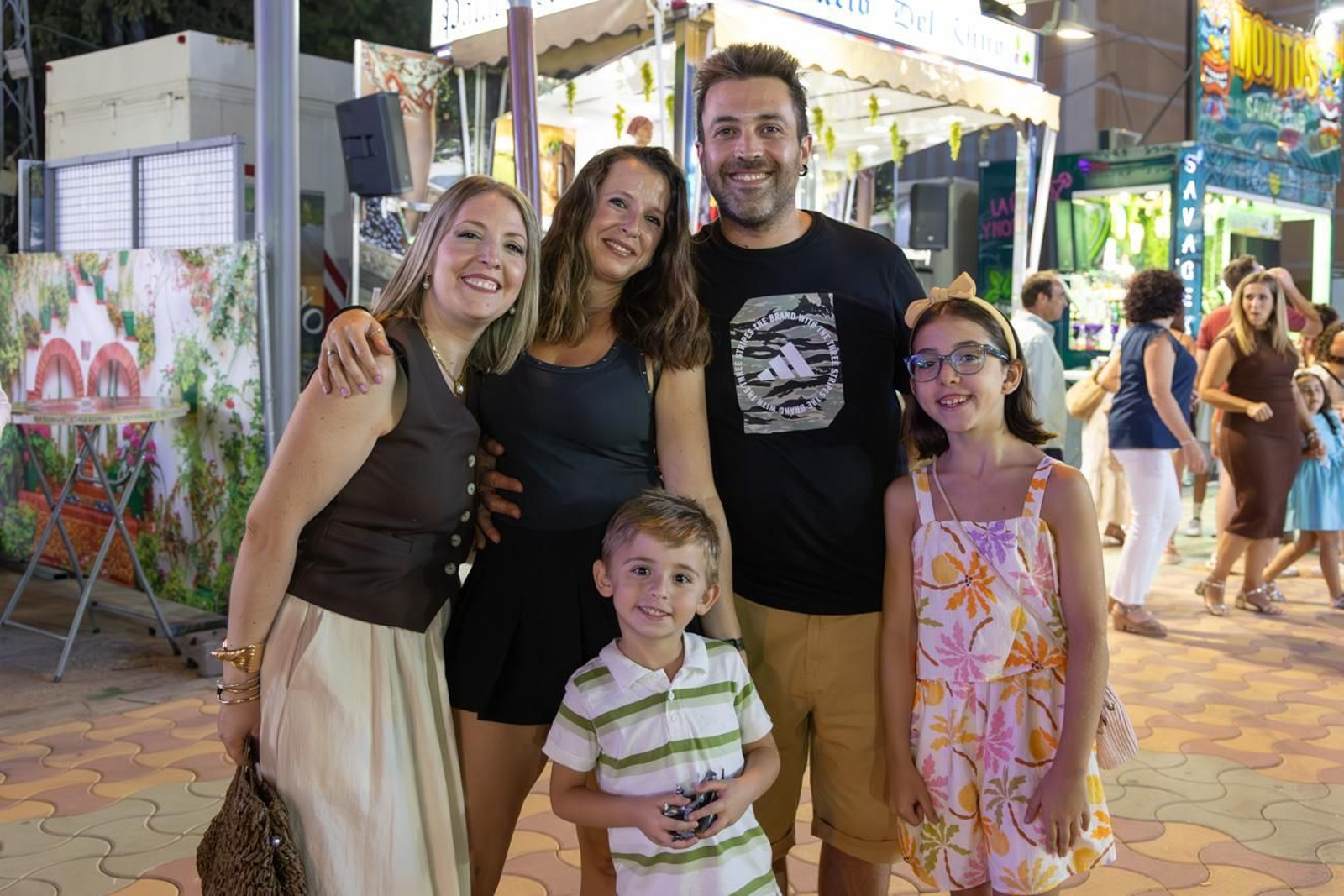 Pasacalles inaugural, fuegos artificiales e iluminación de la portada de feria y del recinto ferial de la Feria de San Bartolomé en Martos